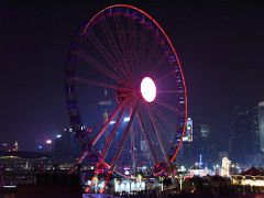 12A Honk Kong Observation ferris Wheel lit up at night from Star Ferry Central pier Hong Kong
